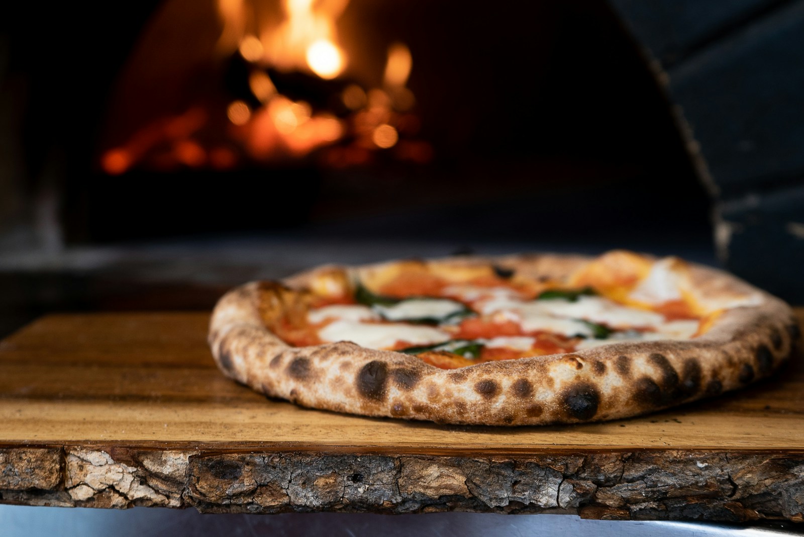 Freshly baked pizza with bubbling cheese, served hot from the oven